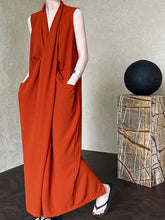 Elegant Draped Sleeveless Midi Dress with Pockets